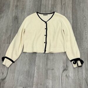 Chic Cream Cardigan with Black Accents
